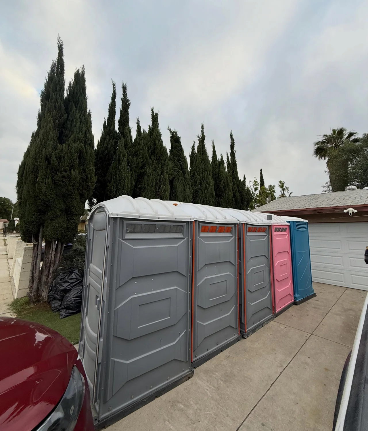 Portable restroom units arranged outdoors
